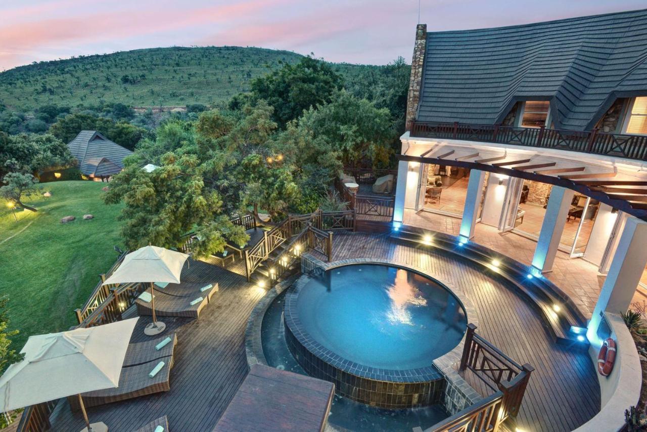 Mount Grace Hotel & Spa Magaliesburg Exterior photo The swimming pool at the resort