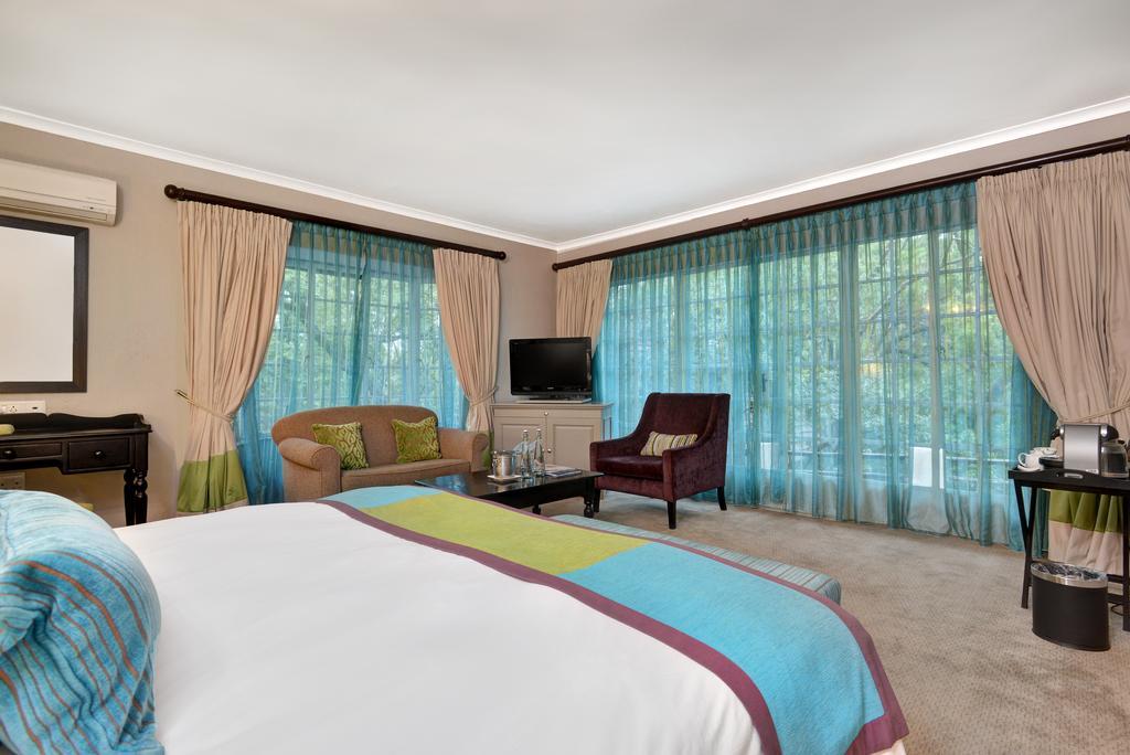Mount Grace Hotel & Spa Magaliesburg Exterior photo A bedroom at the Taj Bengal