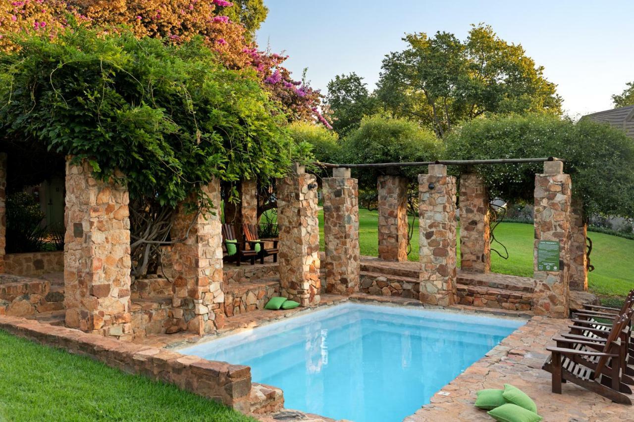 Mount Grace Hotel & Spa Magaliesburg Exterior photo The swimming pool at the house